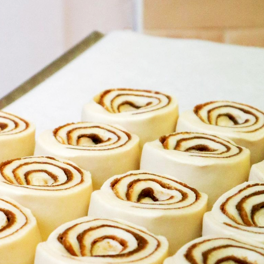 Handcrafted cinnamon bun pastries at Comptoir Bakery