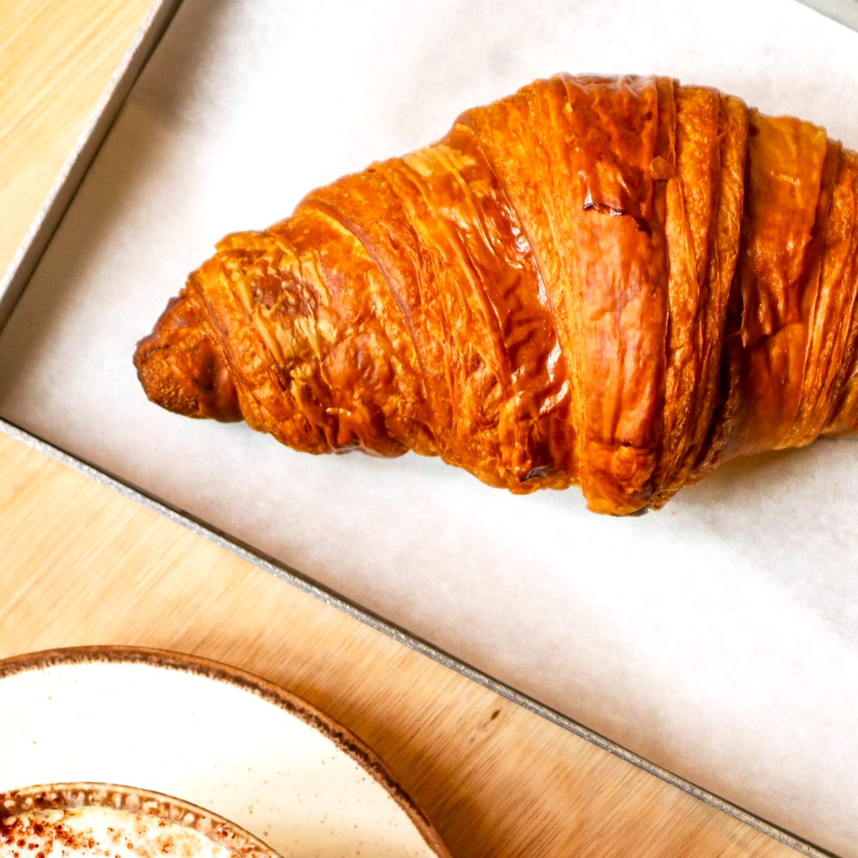 Freshly baked croissants at Comptoir Bakery